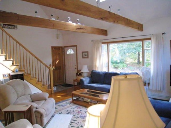 175 Pine Needle Road Wellfleet, MA 02667 - Photo 13 of 23 a living room with furniture and a large window