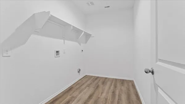 a view of a room with racks on the wall