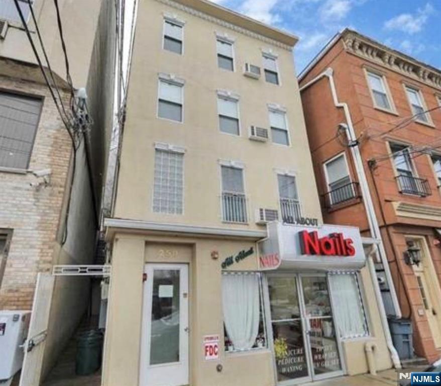 a front view of multi story residential apartment building