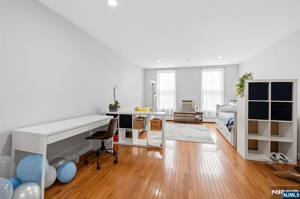 258 Old River Road Edgewater, NJ 07020 - Photo 15 of 32 a view of a living room hardwood floor and a window
