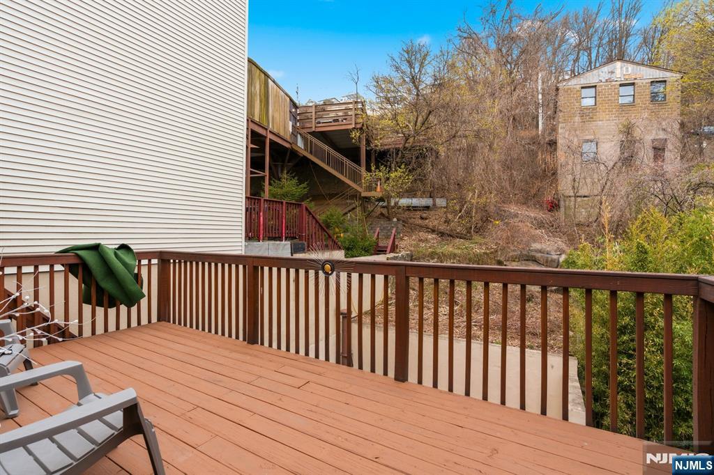 258 Old River Road Edgewater, NJ 07020 - Photo 25 of 32 a balcony with view of wooden floor