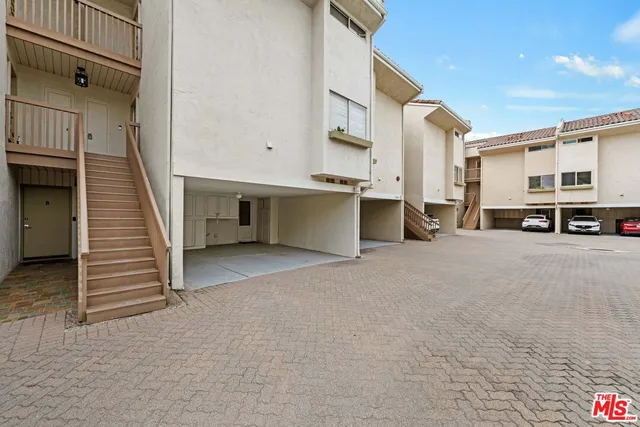 a view of a street with seating space