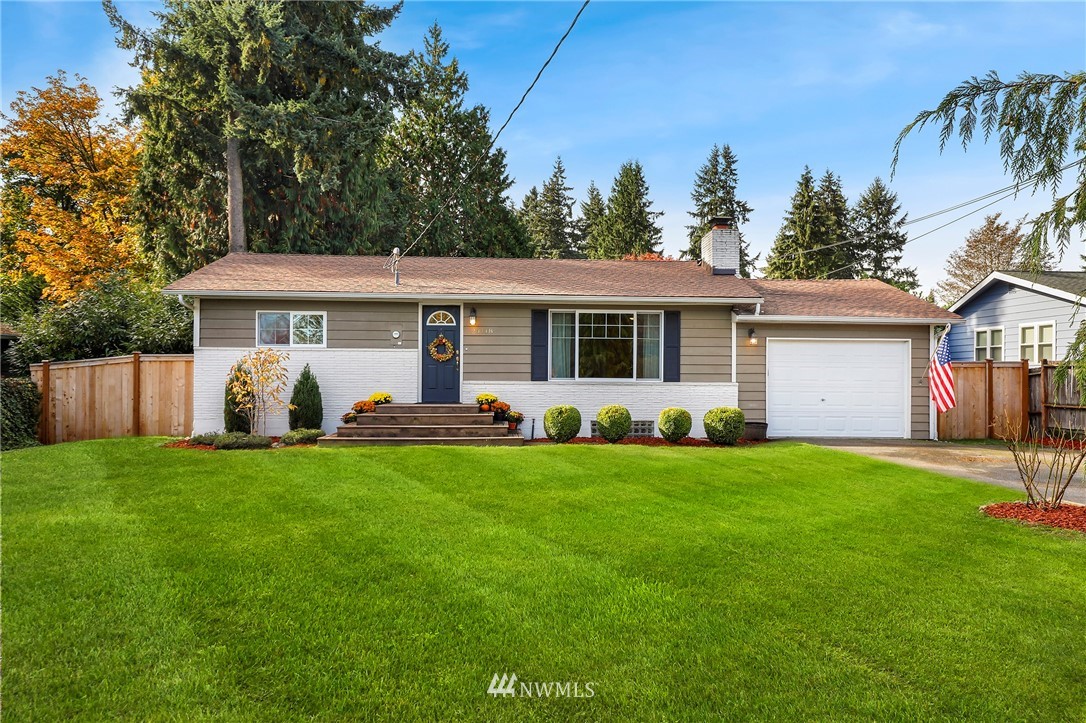 24118 2nd Place West Bothell, WA 98021 - Photo 1 of 25 a view of a house with a backyard