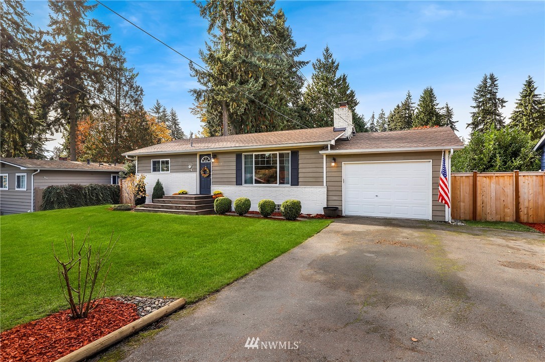 24118 2nd Place West Bothell, WA 98021 - Photo 2 of 25 a view of a house with a yard and tree s