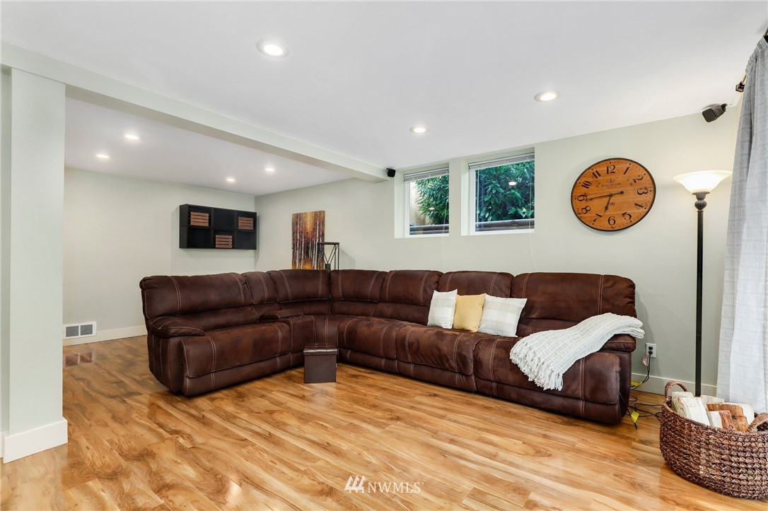 24118 2nd Place West Bothell, WA 98021 - Photo 16 of 25 a living room with furniture and a window