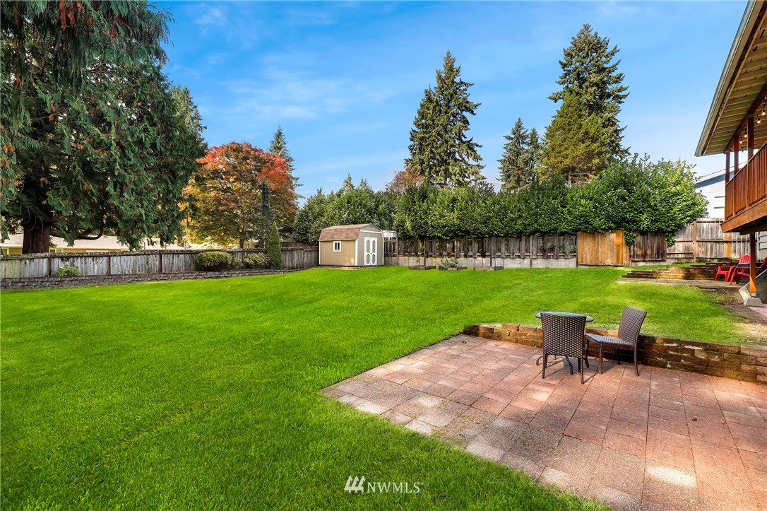 24118 2nd Place West Bothell, WA 98021 - Photo 23 of 25 a view of backyard with table and chairs