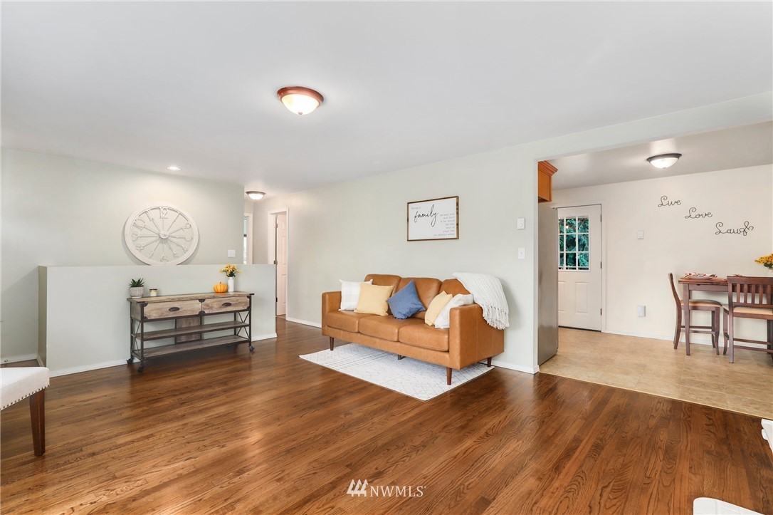 24118 2nd Place West Bothell, WA 98021 - Photo 5 of 25 a living room with furniture and a wooden floor