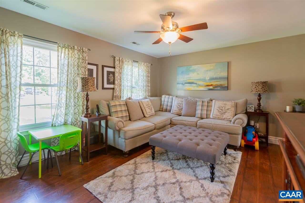 194 Ruckersville Heights Road Ruckersville, VA 22968 - Photo 25 of 38 a living room with furniture and a large window