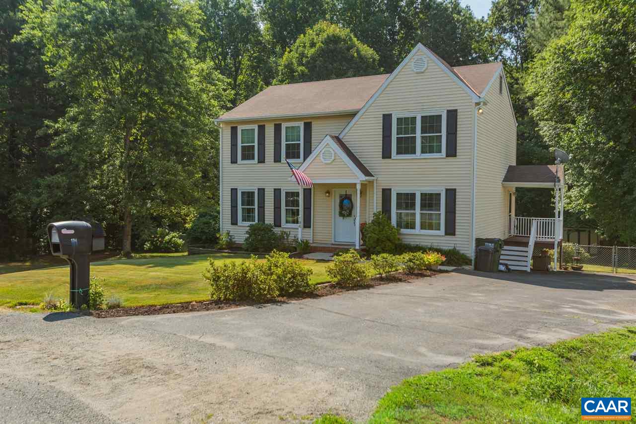 194 Ruckersville Heights Road Ruckersville, VA 22968 - Photo 6 of 38 a front view of a house with a garden and plants