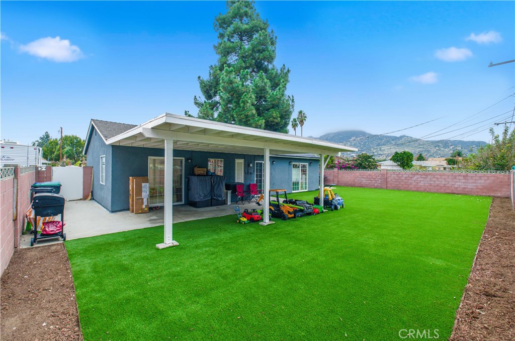 6290 Cynthia Street Simi Valley, CA 93063 - Photo 32 of 32 a view of a house with a yard porch and sitting area