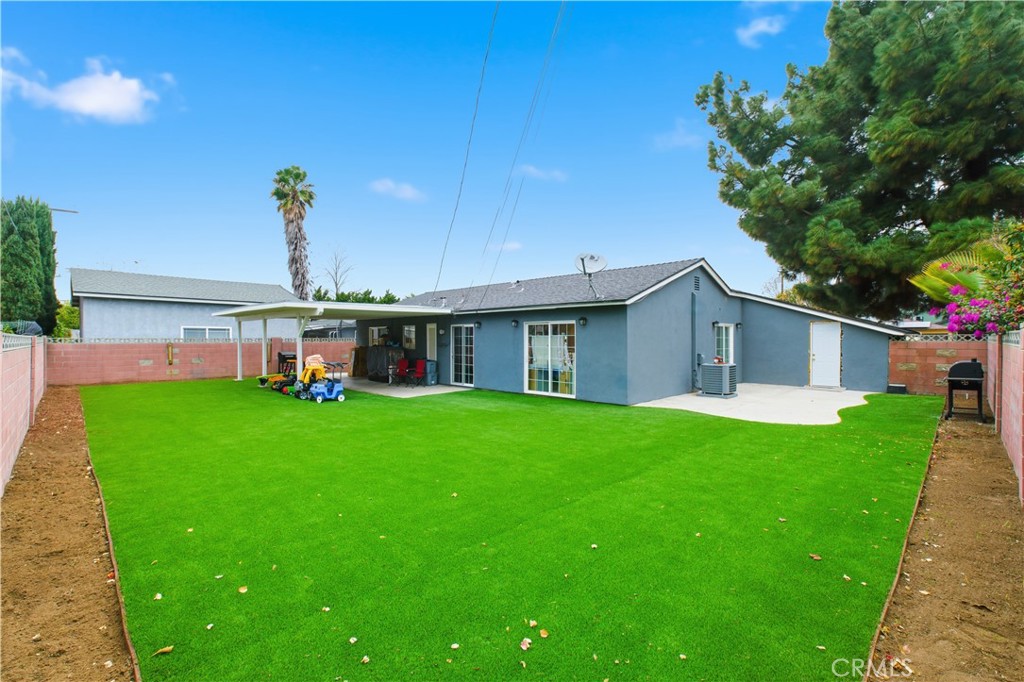6290 Cynthia Street Simi Valley, CA 93063 - Photo 9 of 32 a view of a house with a backyard