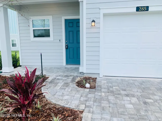 a view of a potted plants in front of door