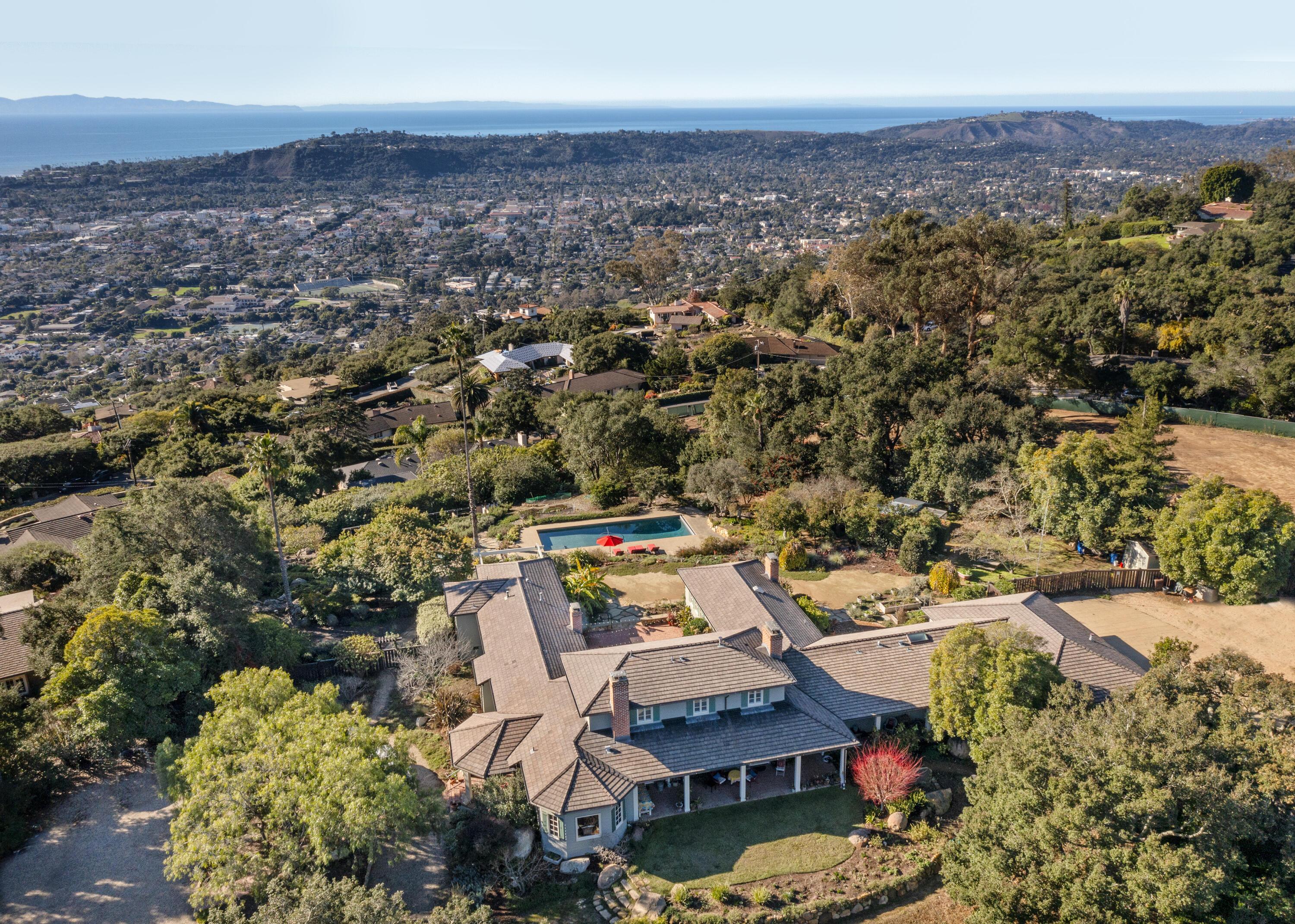 1138 Mission Ridge Road Santa Barbara, CA 93103 - Photo 1 of 54 an aerial view of a house with a garden
