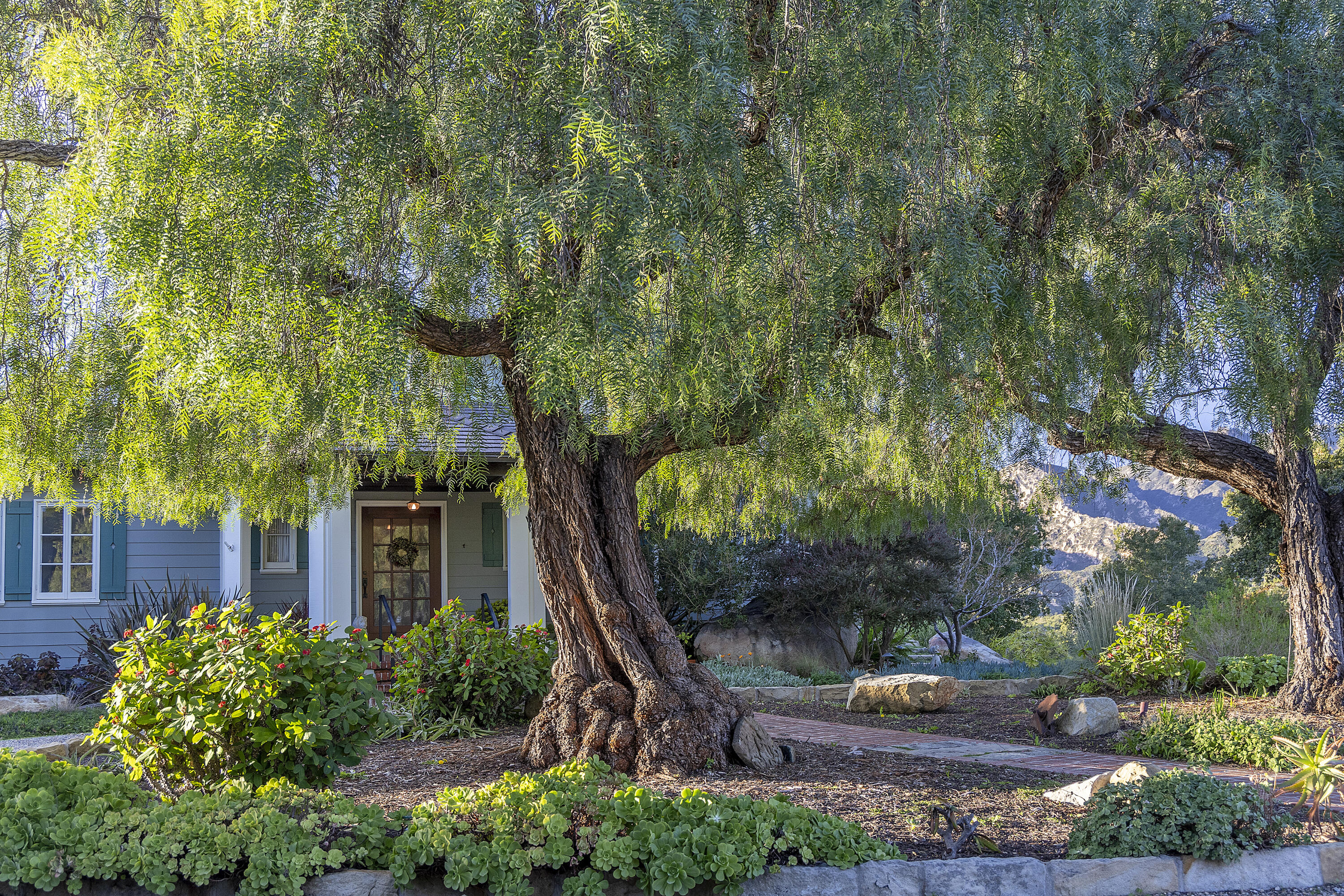 1138 Mission Ridge Road Santa Barbara, CA 93103 - Photo 11 of 54 a front view of a house with a yard