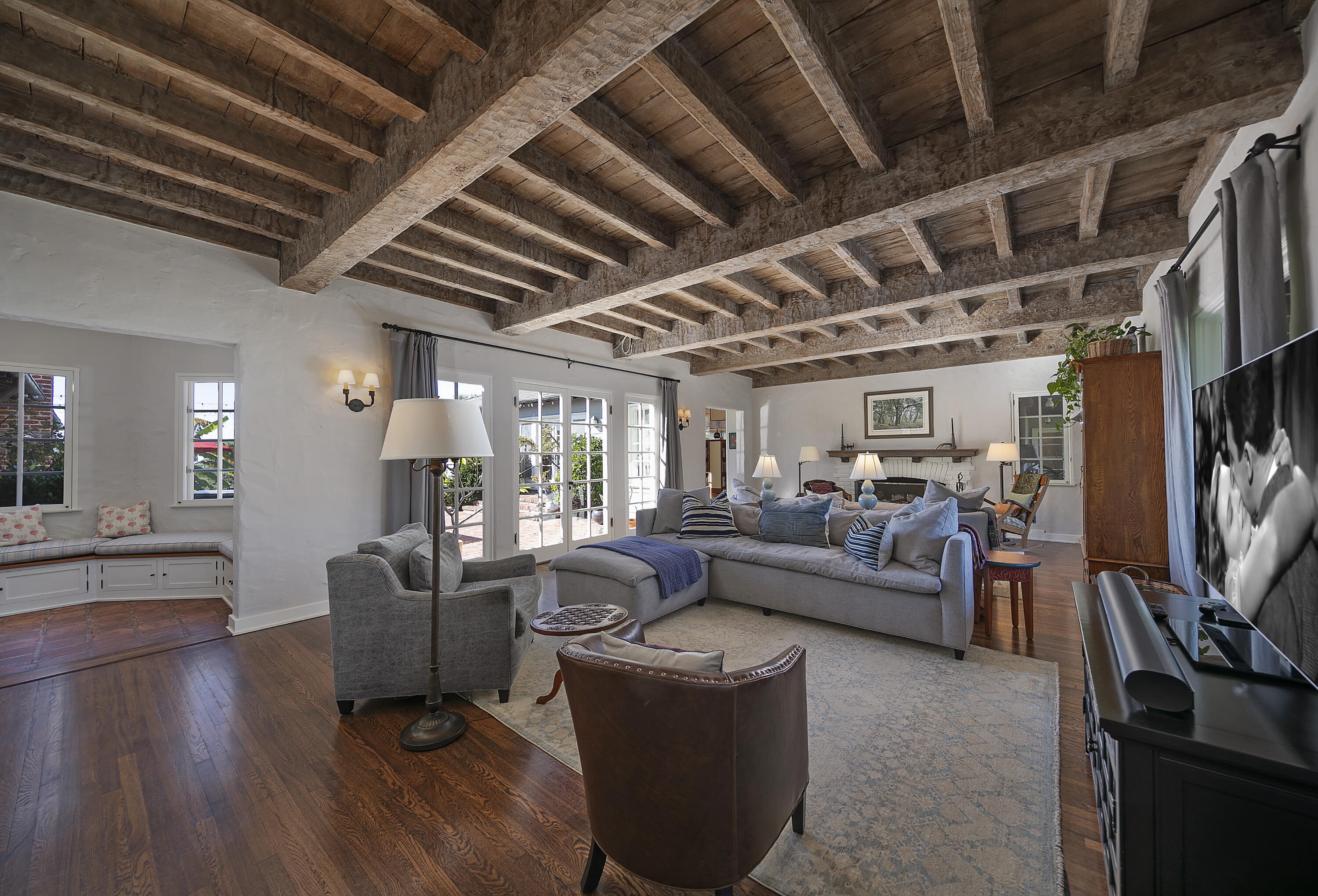 1138 Mission Ridge Road Santa Barbara, CA 93103 - Photo 16 of 54 a living room with furniture and a flat screen tv