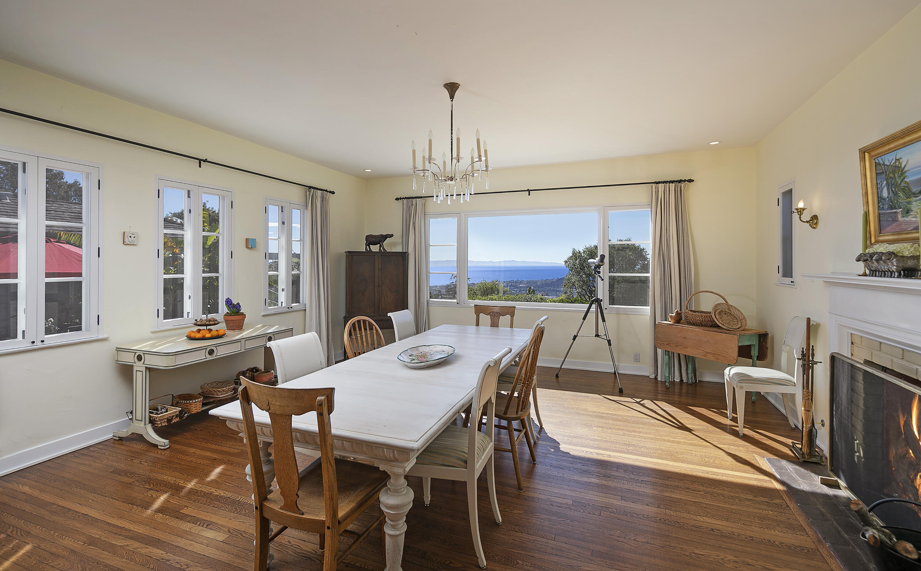 1138 Mission Ridge Road Santa Barbara, CA 93103 - Photo 27 of 54 a view of a dining room with furniture window and wooden floor