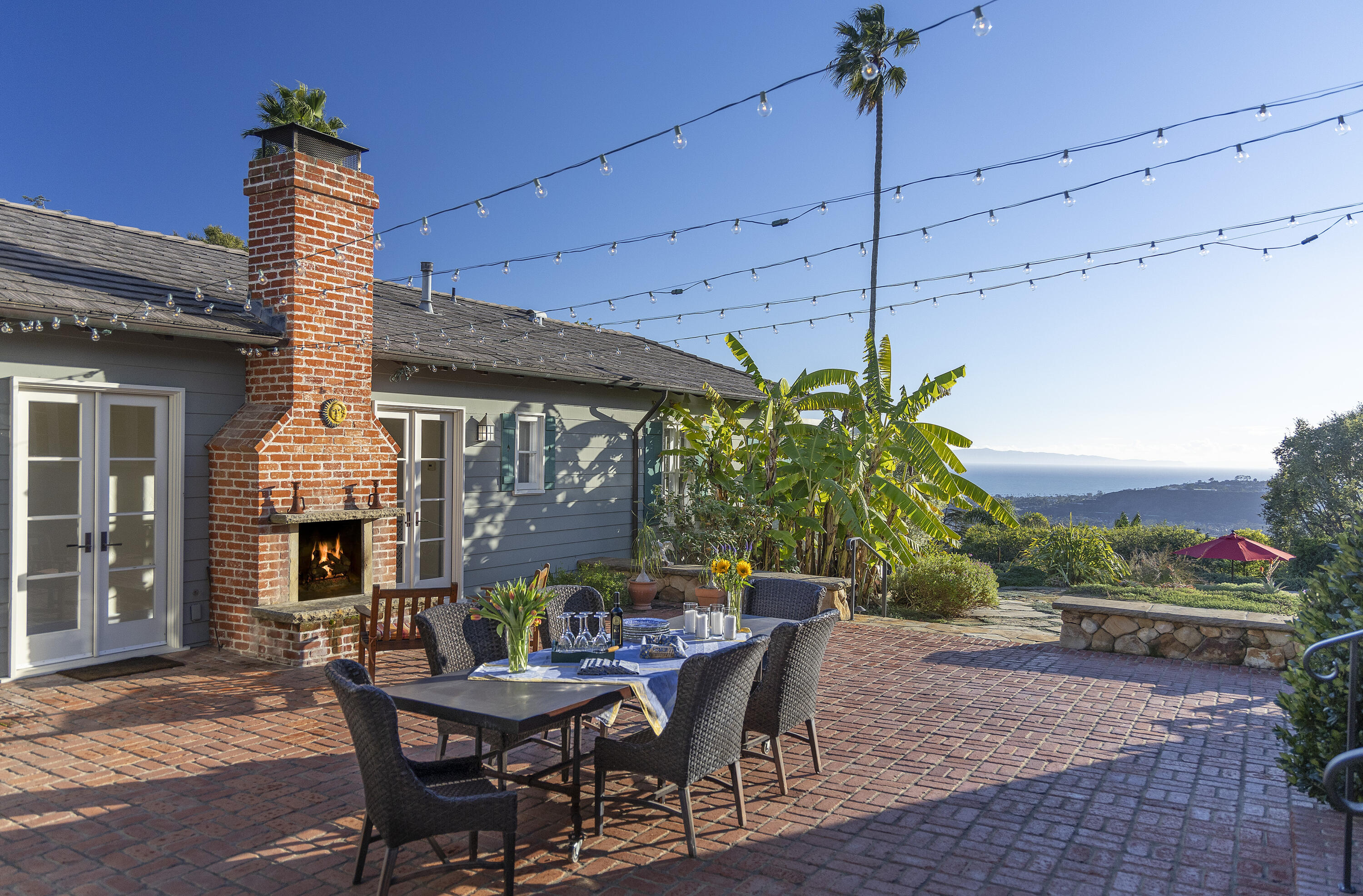 1138 Mission Ridge Road Santa Barbara, CA 93103 - Photo 29 of 54 a patio with a table and chairs