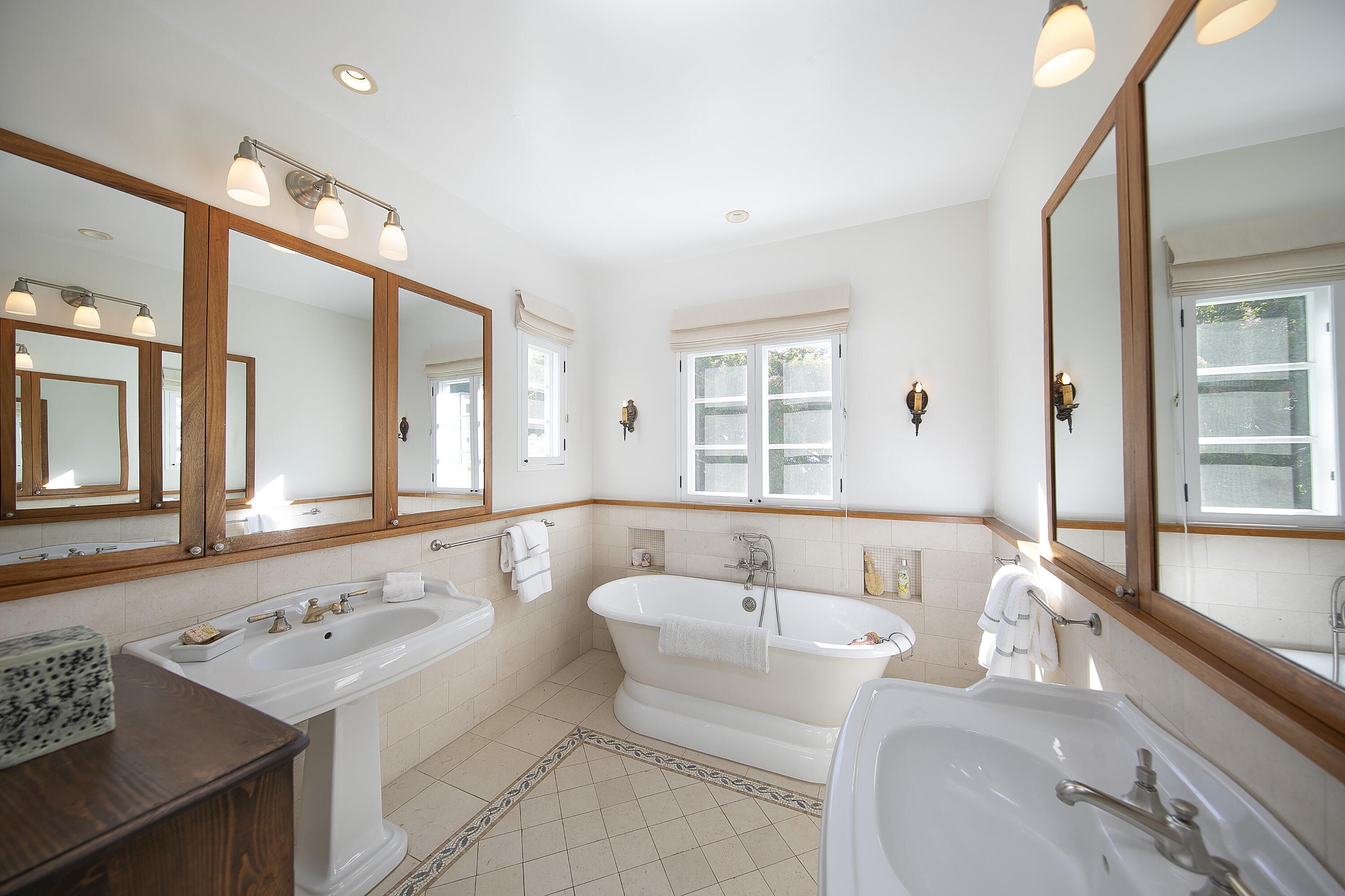1138 Mission Ridge Road Santa Barbara, CA 93103 - Photo 37 of 54 a bathroom with a tub sink and mirror