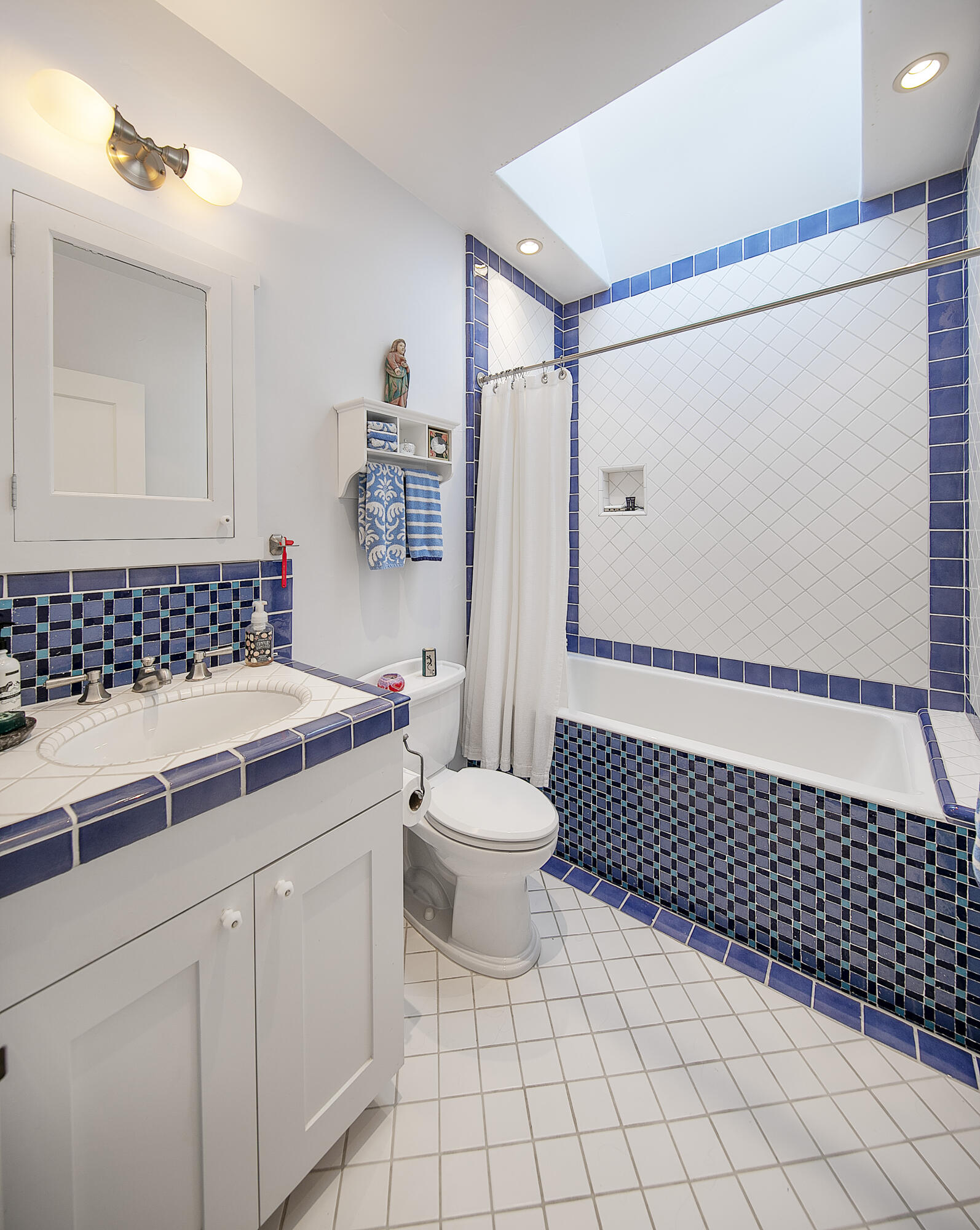1138 Mission Ridge Road Santa Barbara, CA 93103 - Photo 43 of 54 a bathroom with a sink a toilet and shower