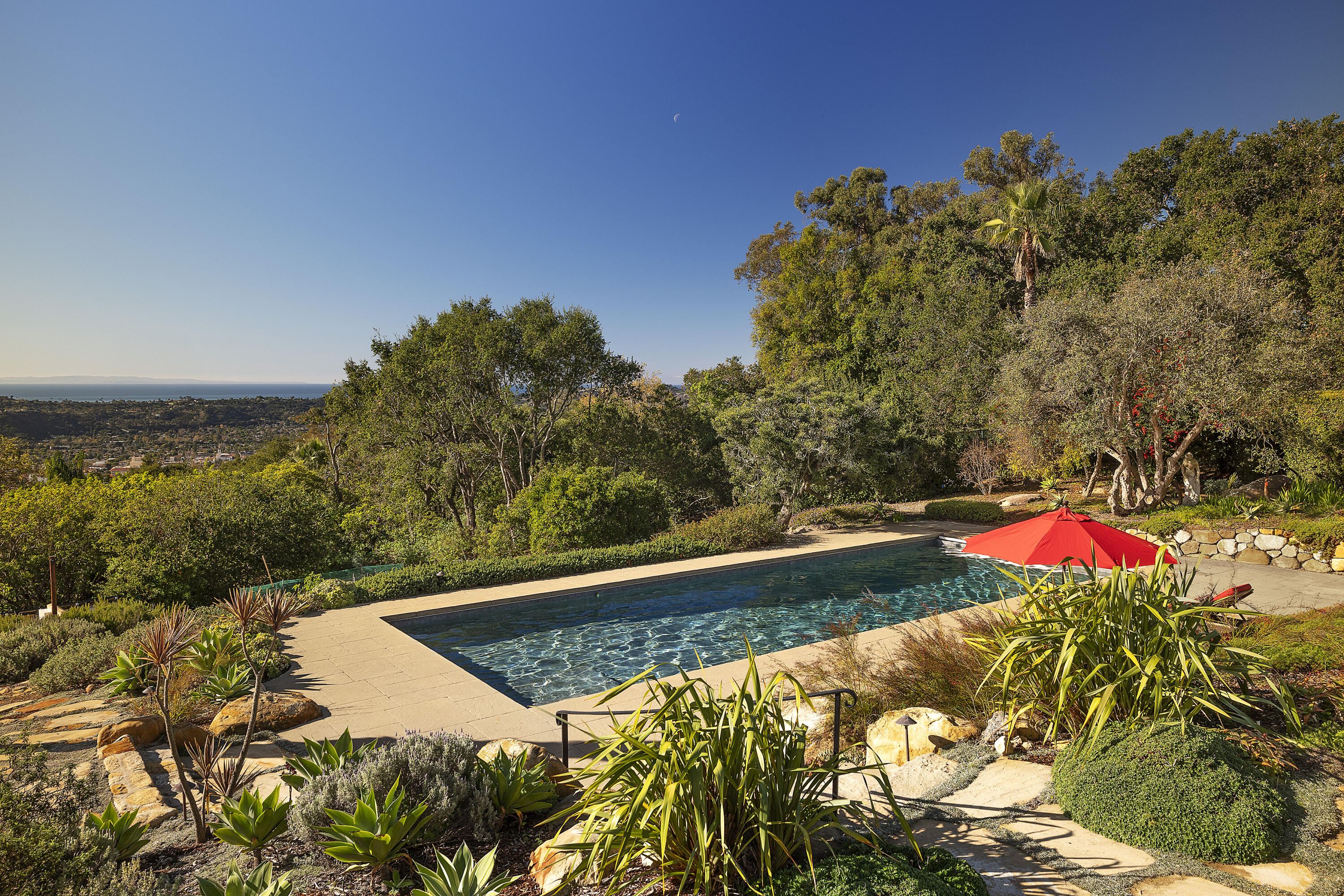 1138 Mission Ridge Road Santa Barbara, CA 93103 - Photo 46 of 54 a view of a yard with an umbrella