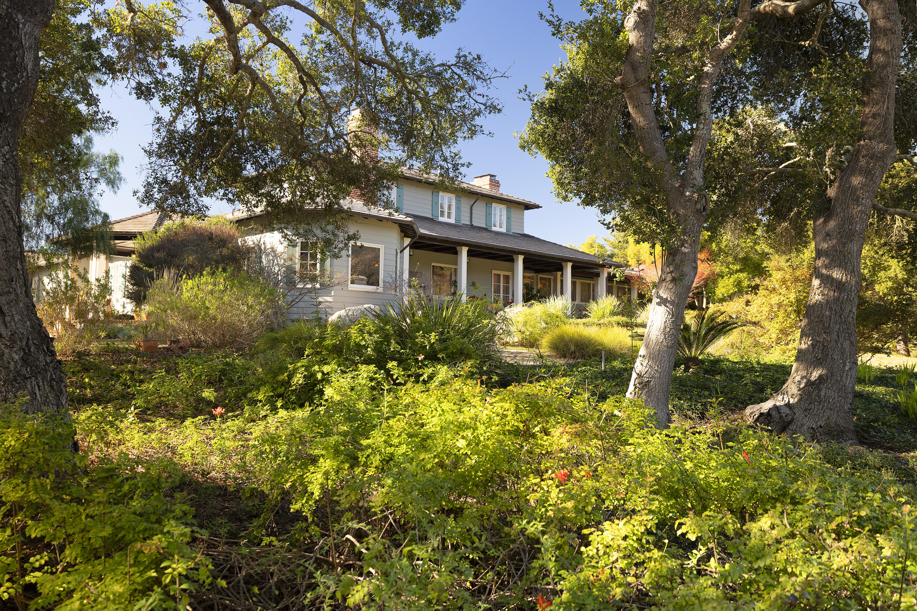1138 Mission Ridge Road Santa Barbara, CA 93103 - Photo 48 of 54 a view of a house with a tree in the yard