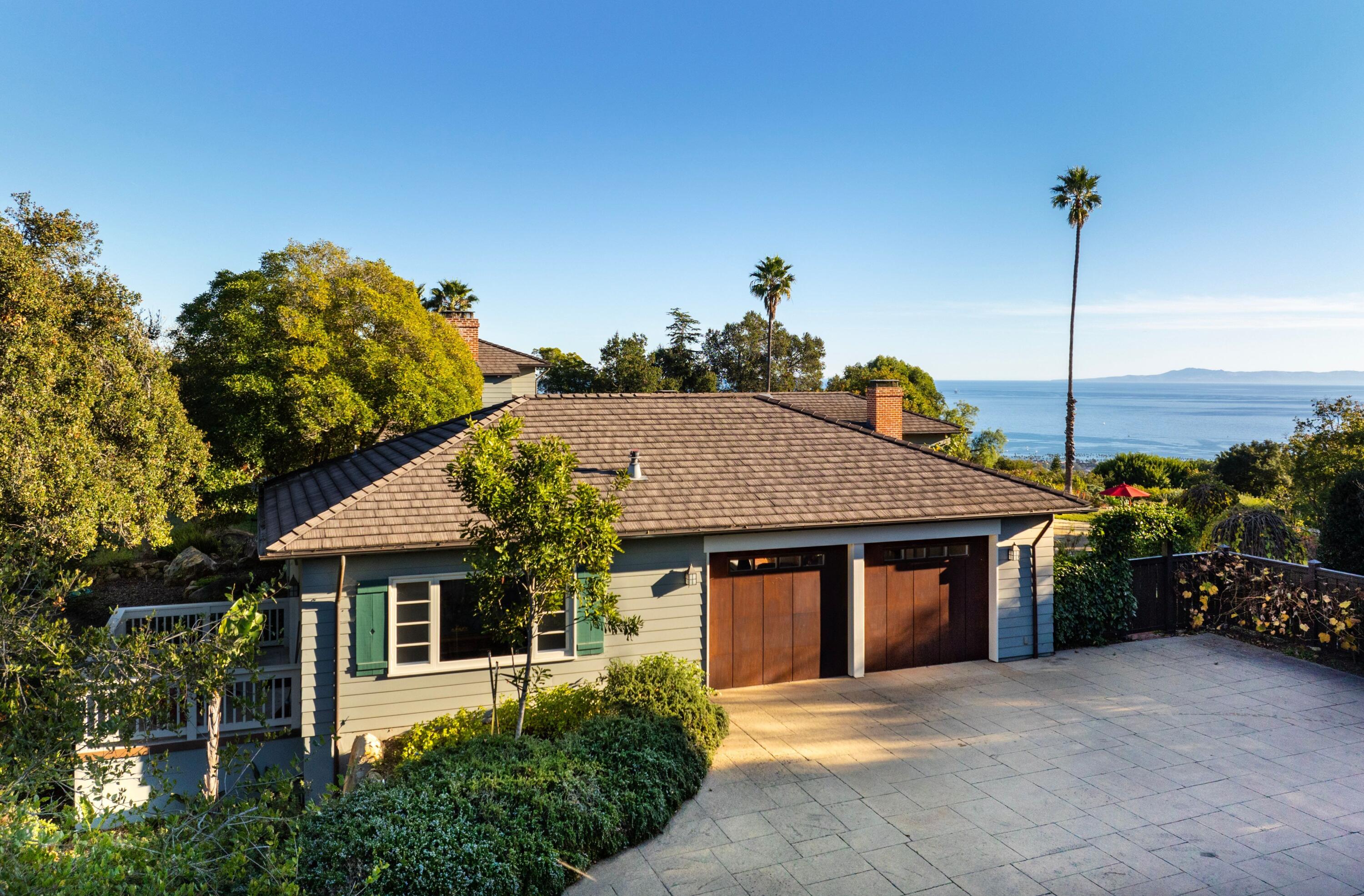 1138 Mission Ridge Road Santa Barbara, CA 93103 - Photo 51 of 54 a front view of a house with a garden