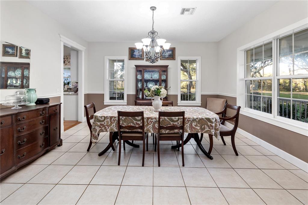 993 Cr 722 Webster Webster, FL 33597 - Photo 16 of 96 a view of a dining room with furniture and window