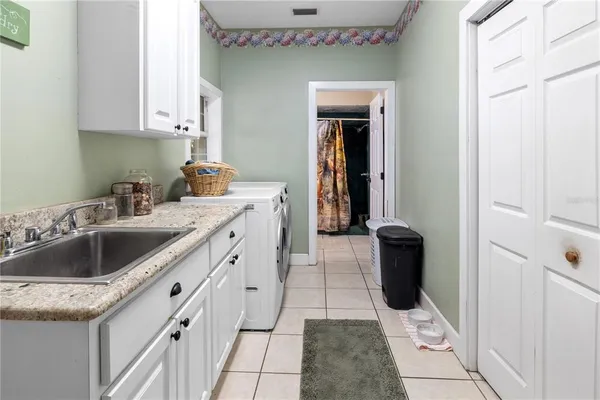 a view of lake with green space