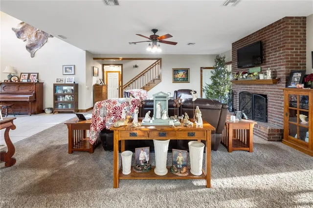 a view of a house with yard and trampoline