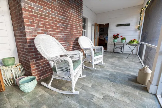 a view of a lake with houses in the back