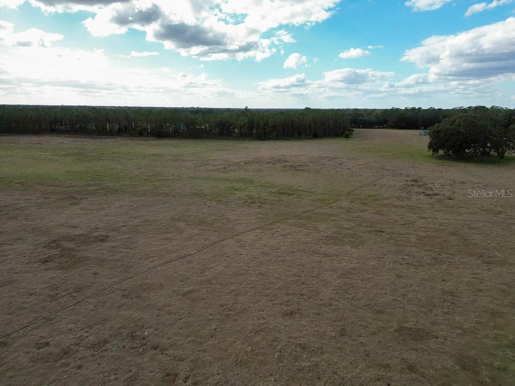993 Cr 722 Webster Webster, FL 33597 - Photo 64 of 96 a view of a lake from a yard
