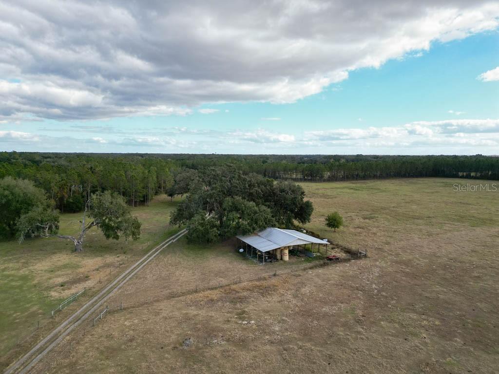 993 Cr 722 Webster Webster, FL 33597 - Photo 65 of 96 a view of a lake with an outdoor space