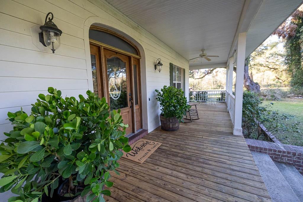 993 Cr 722 Webster Webster, FL 33597 - Photo 8 of 96 a front view of a house with a yard