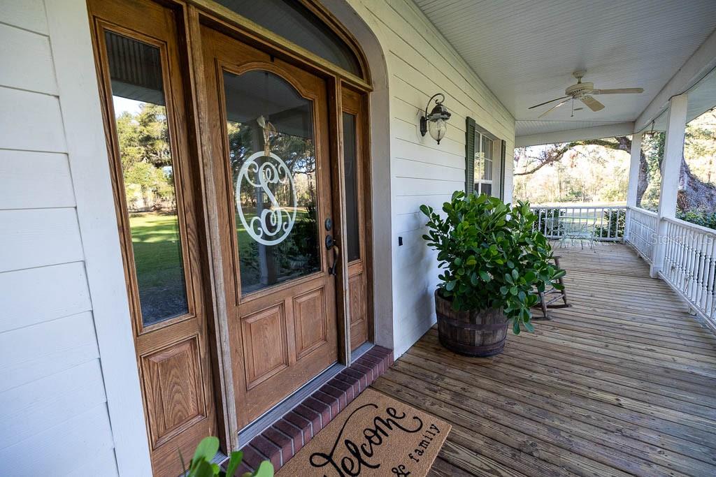 993 Cr 722 Webster Webster, FL 33597 - Photo 9 of 96 a view of a entryway door front of house