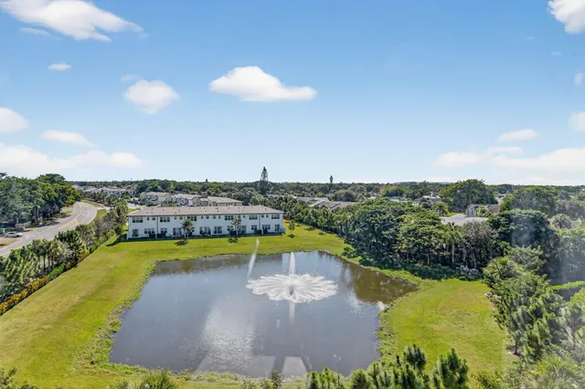 an aerial view of a house outdoor space and street view