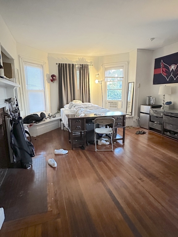 27 Orkney Road, Unit 1 Boston, MA 02135 - Photo 12 of 26 a living room with furniture and wooden floor