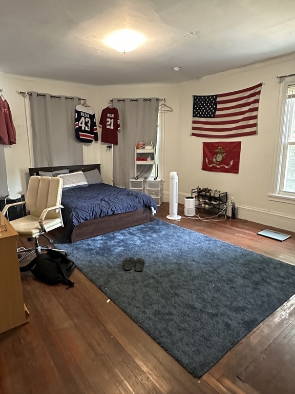 27 Orkney Road, Unit 1 Boston, MA 02135 - Photo 23 of 26 a living room with furniture and a rug