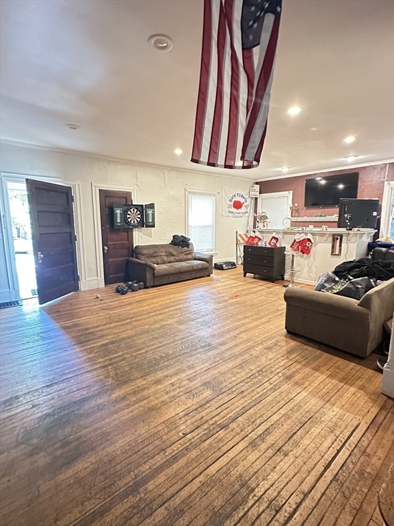 27 Orkney Road, Unit 1 Boston, MA 02135 - Photo 6 of 26 a living room with furniture and a flat screen tv