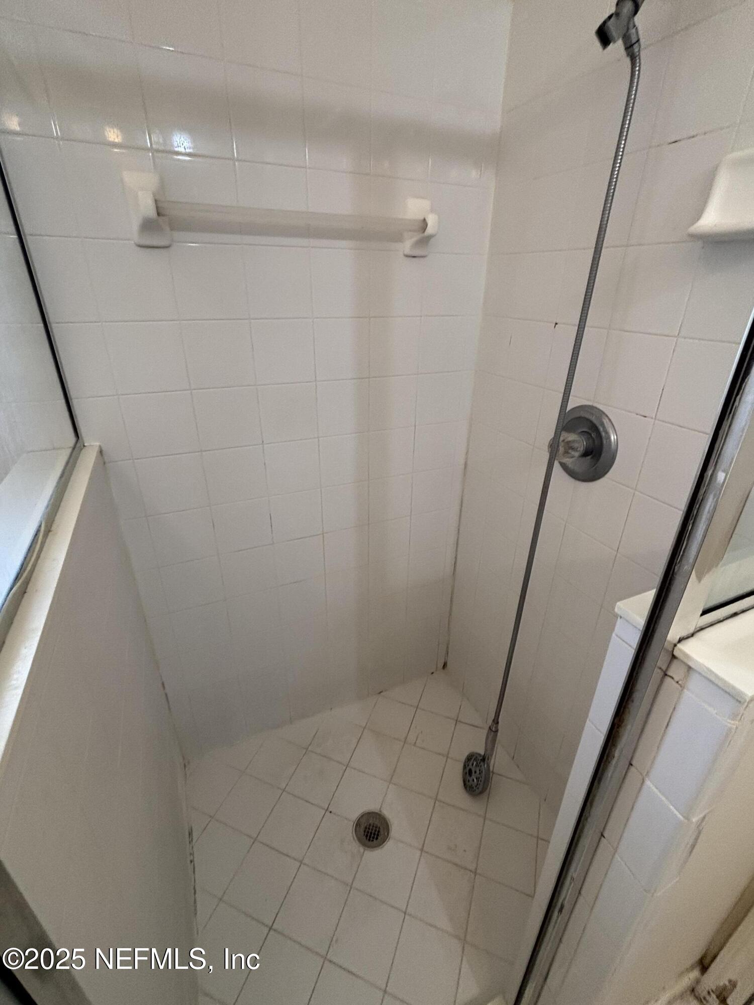 817 Oak Arbor Circle St. Augustine, FL 32084 - Photo 11 of 19 a bathroom with a shower