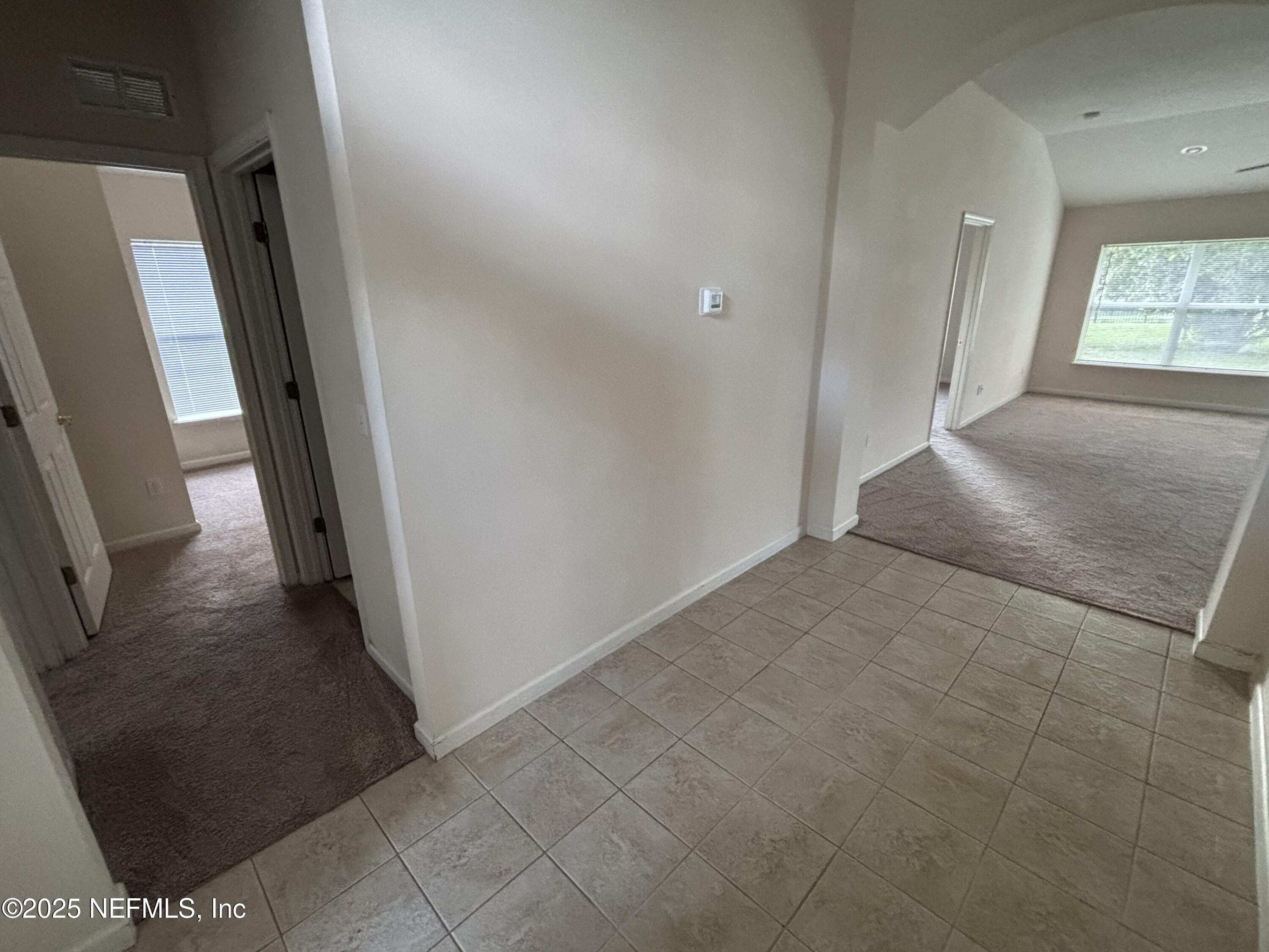 817 Oak Arbor Circle St. Augustine, FL 32084 - Photo 13 of 19 a view of a livingroom with a staircase
