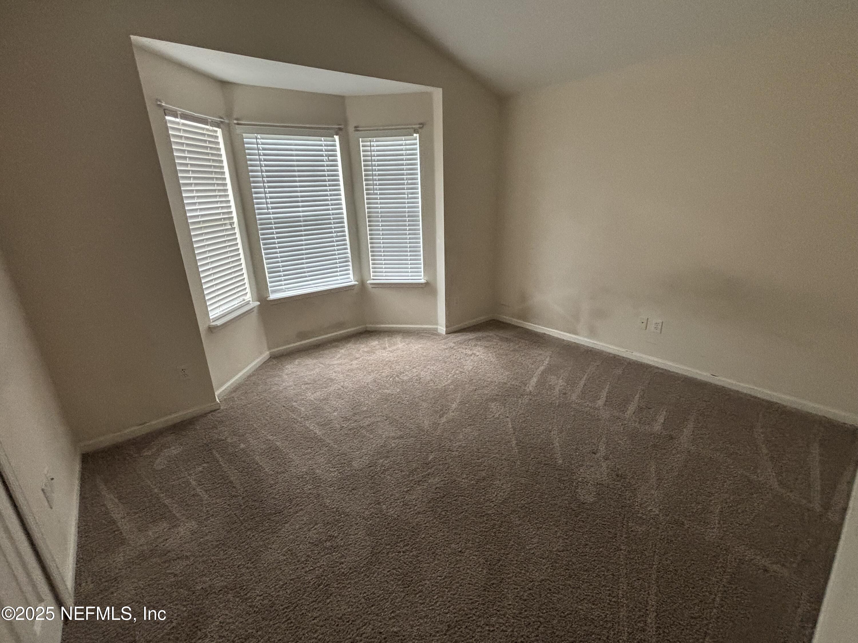 817 Oak Arbor Circle St. Augustine, FL 32084 - Photo 14 of 19 an empty room with windows