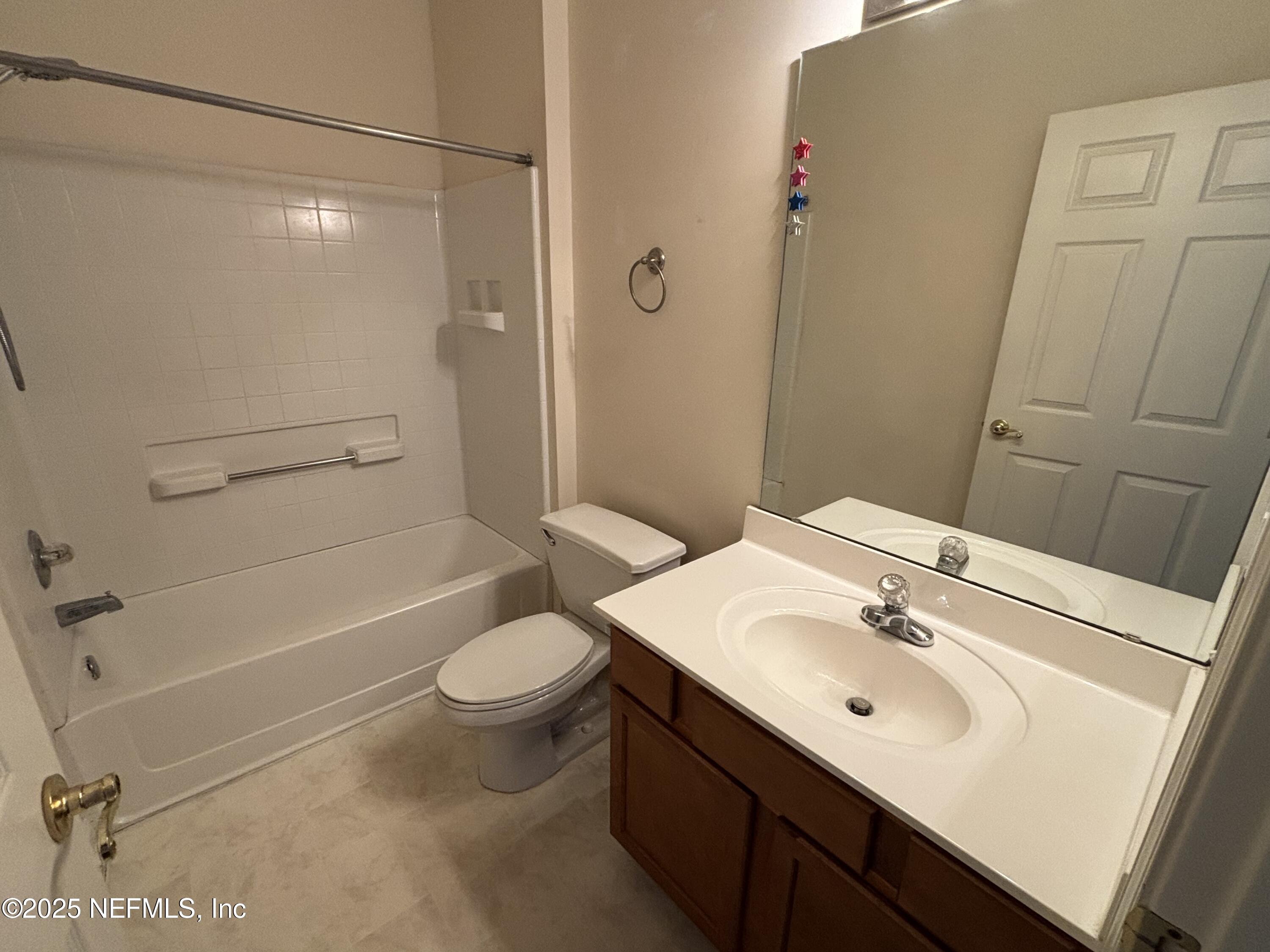 817 Oak Arbor Circle St. Augustine, FL 32084 - Photo 15 of 19 a bathroom with a sink a toilet and shower