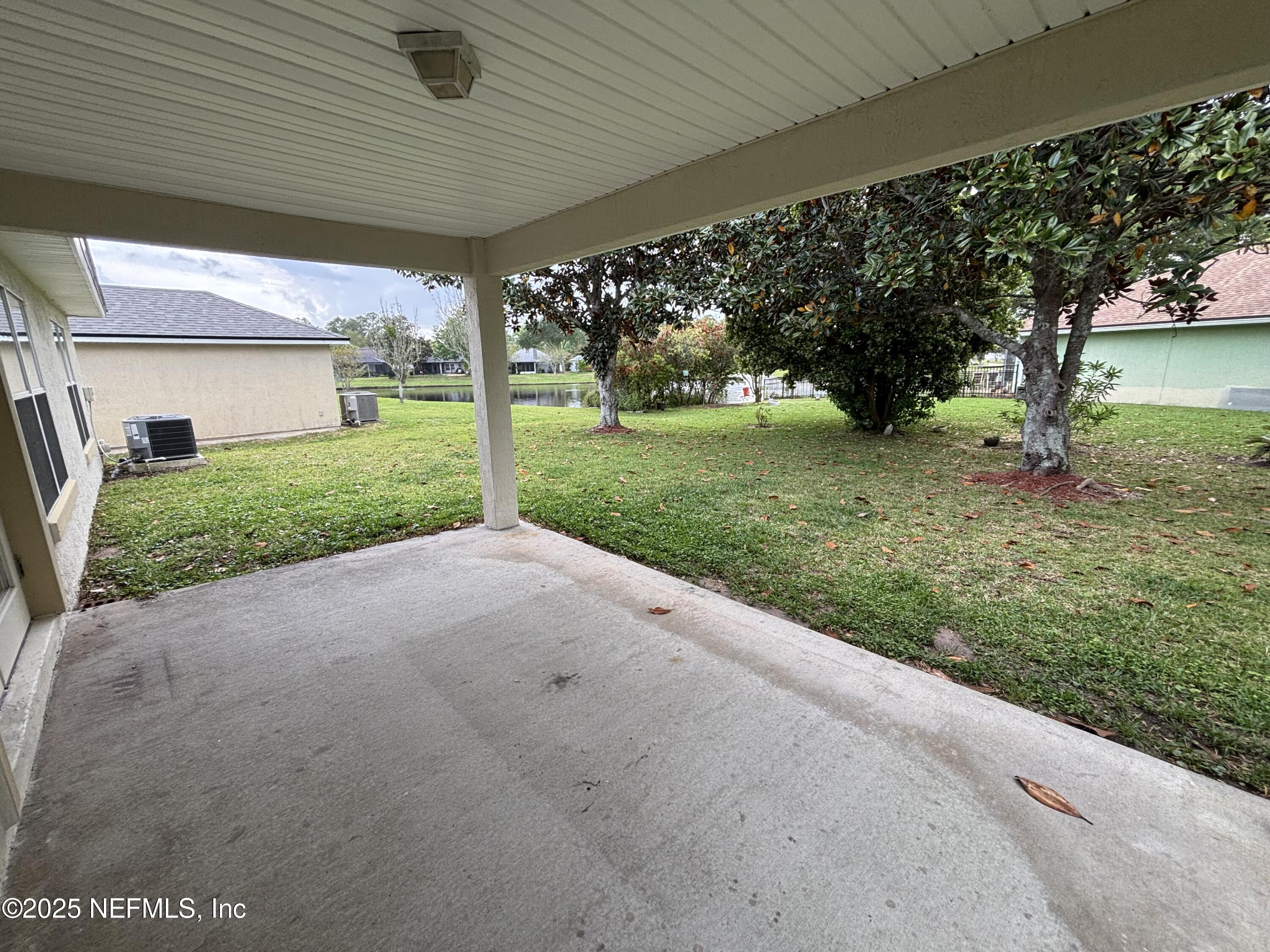 817 Oak Arbor Circle St. Augustine, FL 32084 - Photo 17 of 19 a view of a house with a yard