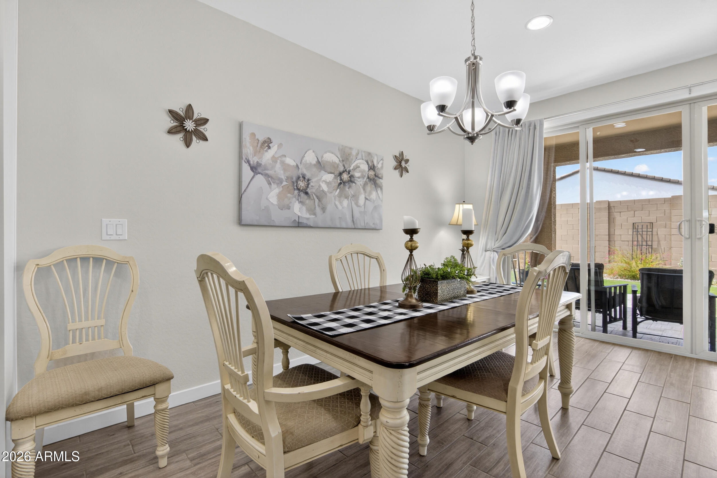 12330 East Soloman Road Gold Canyon, AZ 85118 - Photo 17 of 69 a view of a dining room with furniture and chandelier