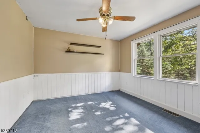 a view of a room with racks on the wall