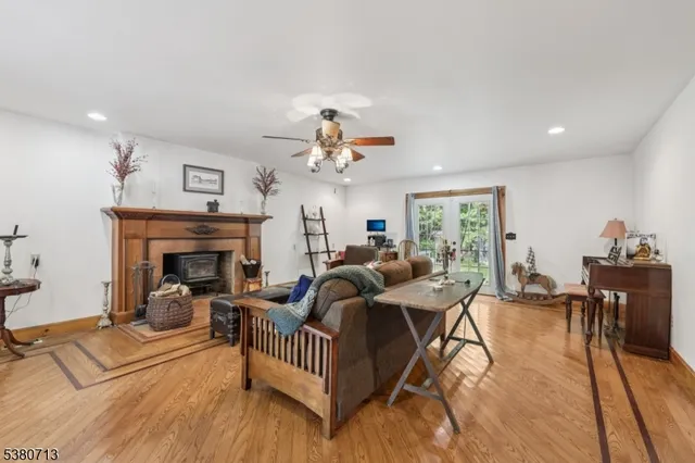 a living room with furniture or couch and a chandelier