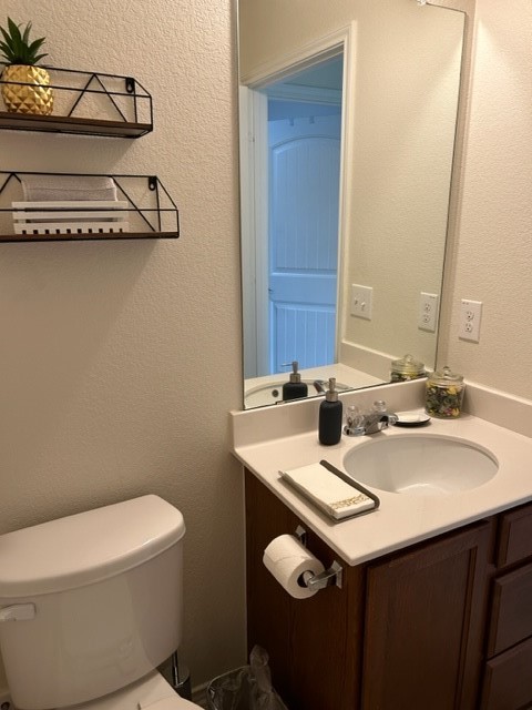 9008 Norwich Castle Austin, TX 78747 - Photo 15 of 26 a bathroom with a sink and a toilet