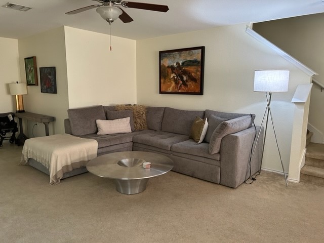 9008 Norwich Castle Austin, TX 78747 - Photo 3 of 26 a living room with furniture and a flat screen tv