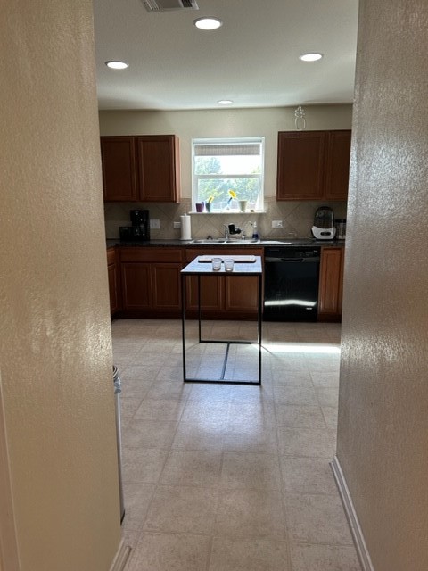 9008 Norwich Castle Austin, TX 78747 - Photo 7 of 26 a kitchen with a refrigerator and a counter top space