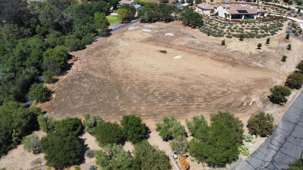 3006 Via Montevina Fallbrook, CA 92028 - Photo 2 of 8 an aerial view of a house with a yard